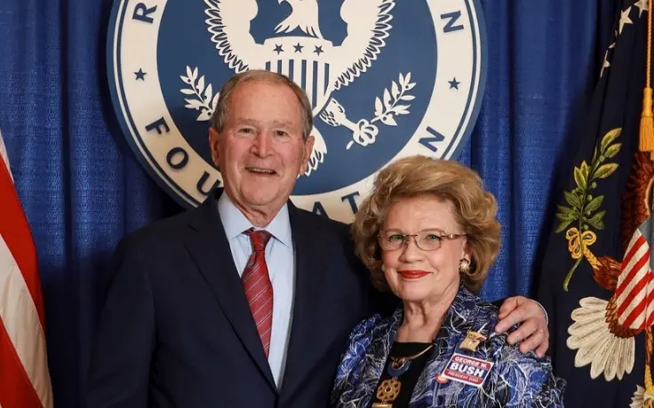 Former President George W. Bush and a CCE TUIT