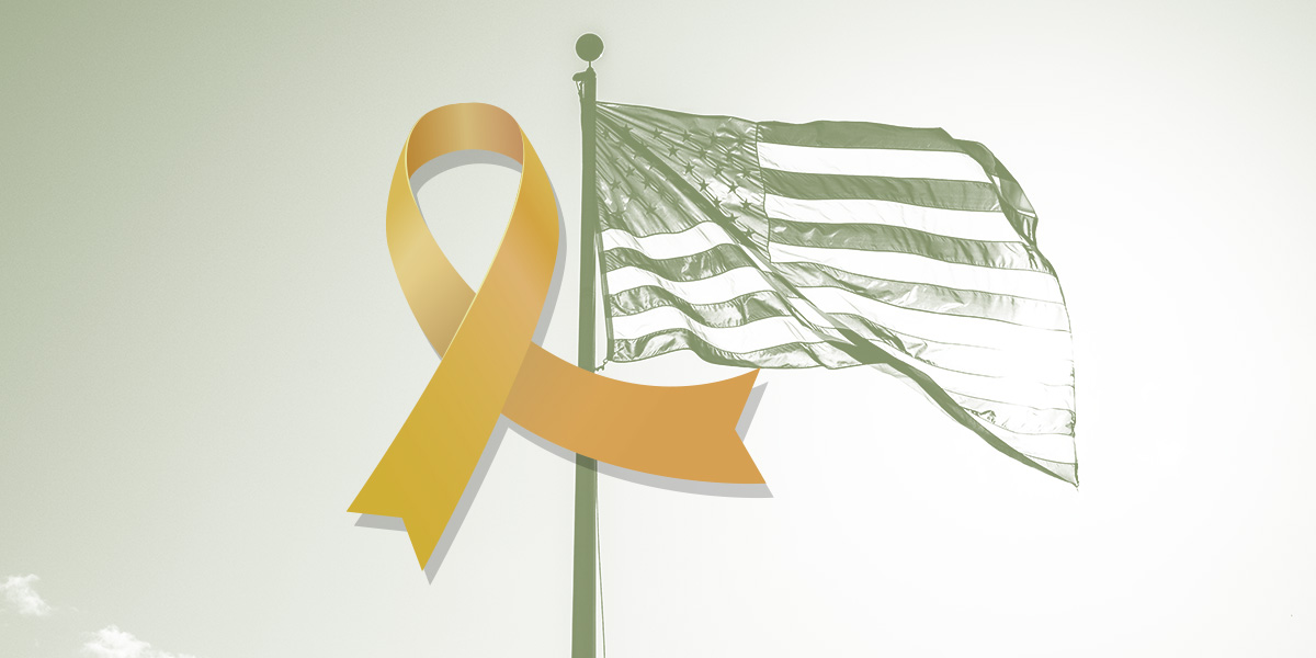 Yellow ribbon overlaying an image of the American flag